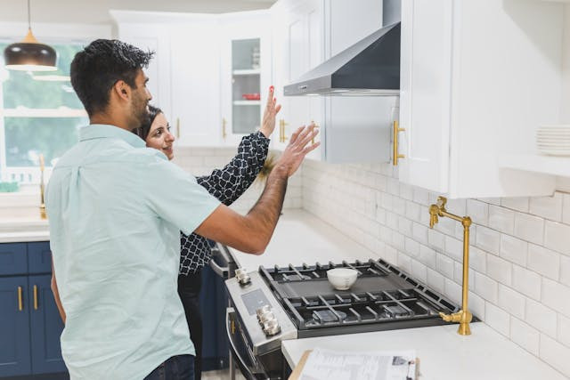 two-people-looking-at-a-house-kitchen