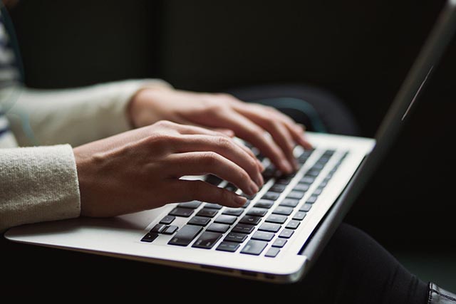 person-typing-on-a-computer